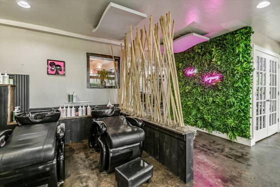 Suite 103 — wash stations with living-wall accent