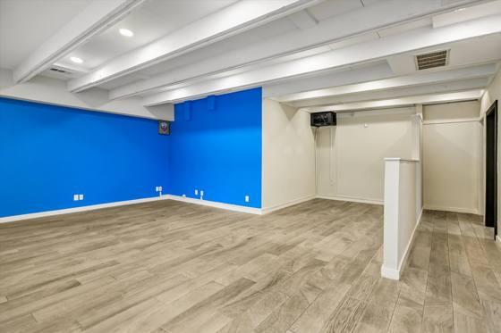Suite 102 — feature wall and half-wall partition