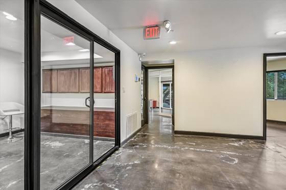 Suite G100 — glass-front private office