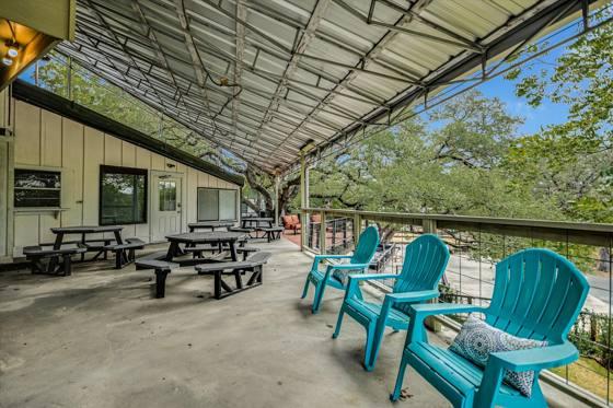 Covered upper deck seating serving Suites 100, 102 and 103