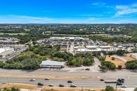Aerial — the site on Hwy 71 with the Shops at the Galleria beyond