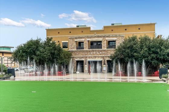 Galleria lawn, fountains and Bee Cave Public Library